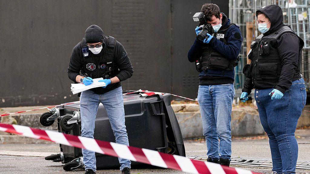 Picnic area in Trappes with police and emergency vehicles after shooting