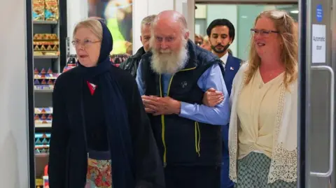 British Couple Rescued from Taliban Detainees Back Home in the UK