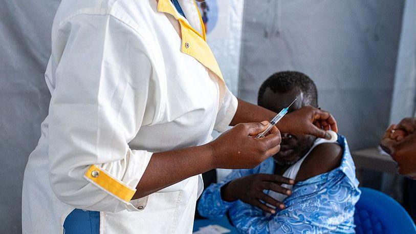 Health worker in white coat