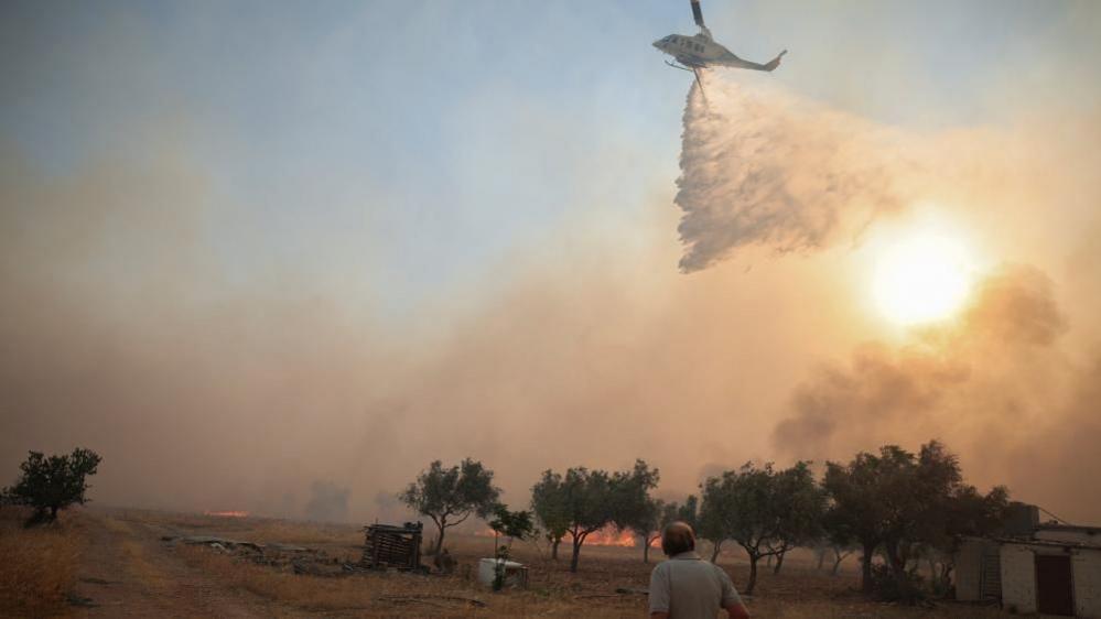 Mid‑Air Crash: Helicopters Collide While Fighting Greek Wildfires