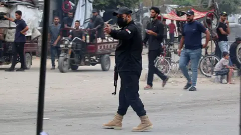 Violence Erupts in Gaza City: 27 Lives Lost in Clash Between Hamas and Dughmush Family