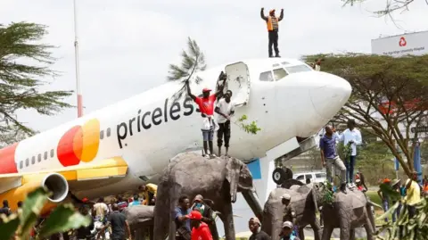 Kenya's Airport Sees Chaos as Thousands Gather to Welcome Home Raila Odinga