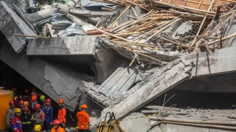 Tragic School Collapse in Indonesia: Three Lives Lost, Many Still Trapped