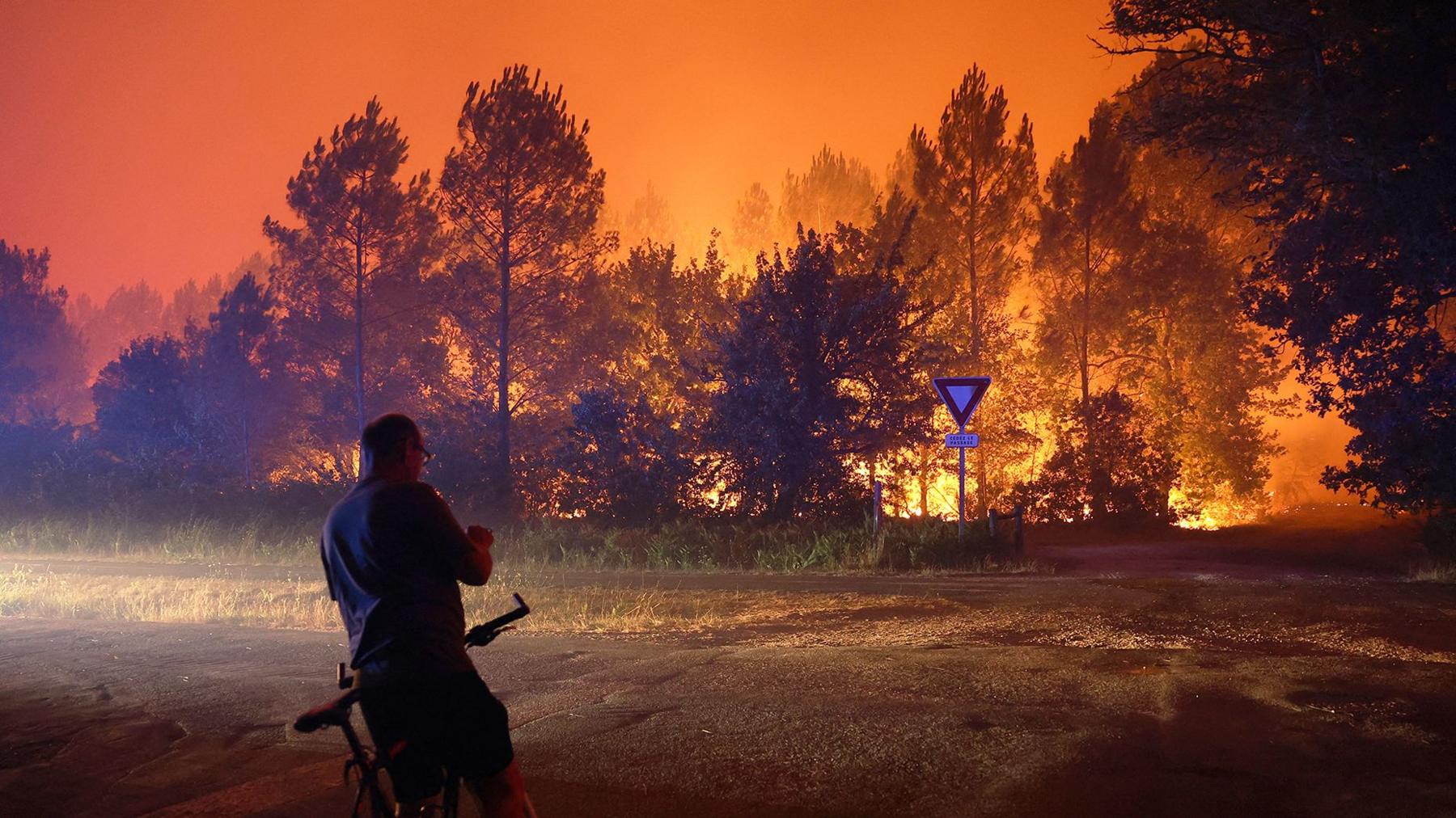 Wildfires Blaze Europe: 12,000 Evacuated, Two Firefighters Lost