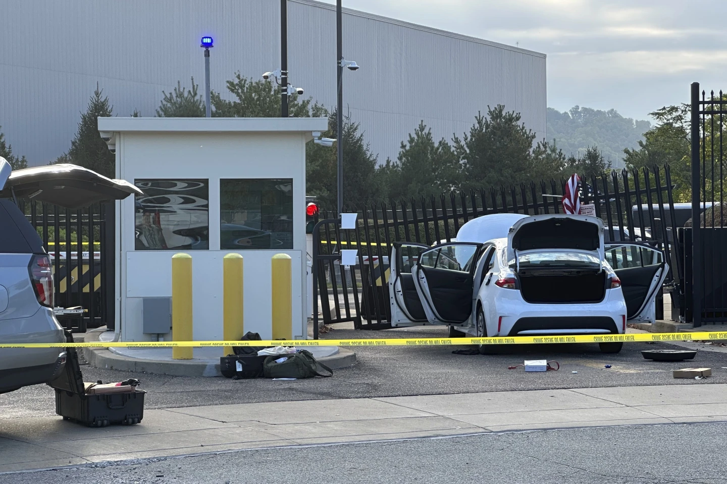 Man Rams FBI Gate with Flag-Draped Car: A Bold Statement?