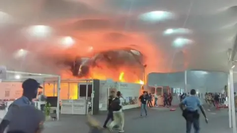 Flames Disrupt COP30 Climate Talks in Brazil