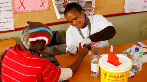 US Cuts AIDS Funding to South Africa