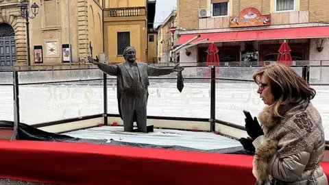 Pavarotti’s Statue Encased in Ice Sparks Controversy in Italy